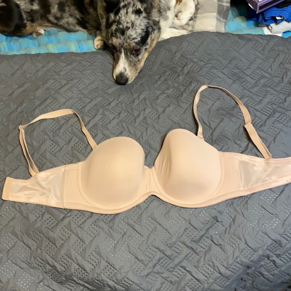 Brand new nude bra that can be worn without straps .